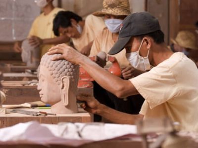 Artisan carving the buddha statue, Cambodia trips